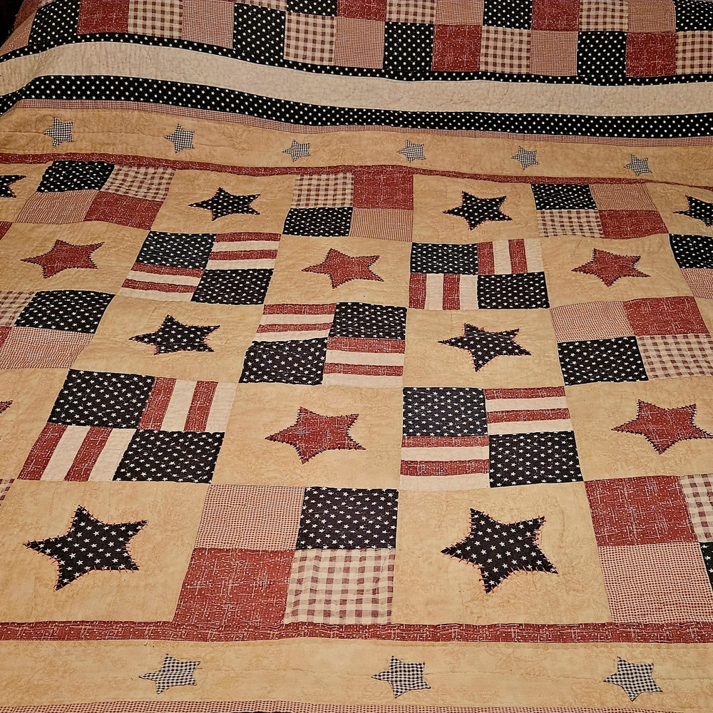 Patchwork Star Quilt in Red, Blue, and Tan